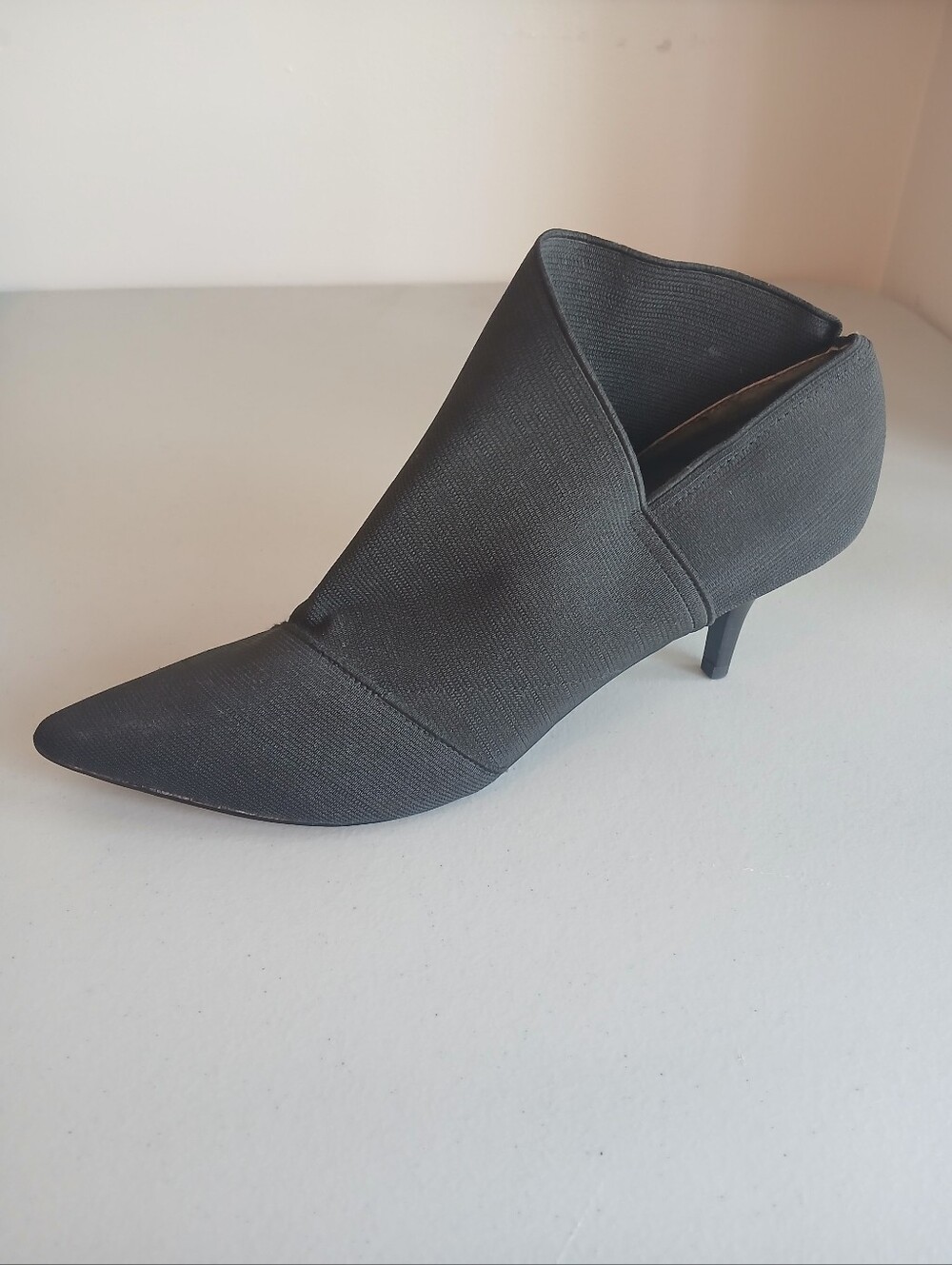 Black Allover Stretch Asymmetric Ankle Bootie 10M NWOT